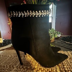 Express heeled booties. Never worn. Size 7.5. Runs on small side, closer to a 7.
